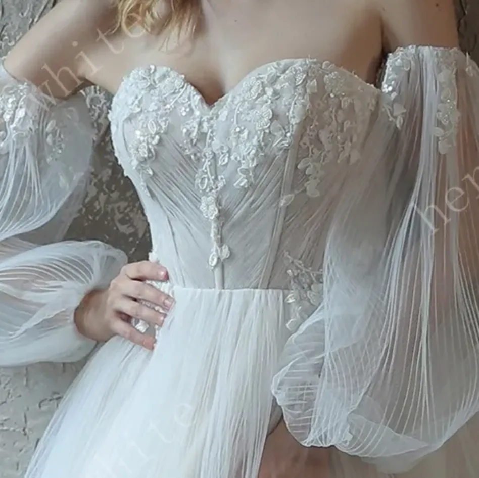 Enchanting Pleated Tulle A-line Wedding Dress with Pouf Sleeves