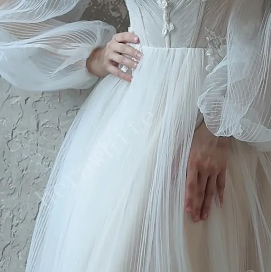 Enchanting Pleated Tulle A-line Wedding Dress with Pouf Sleeves