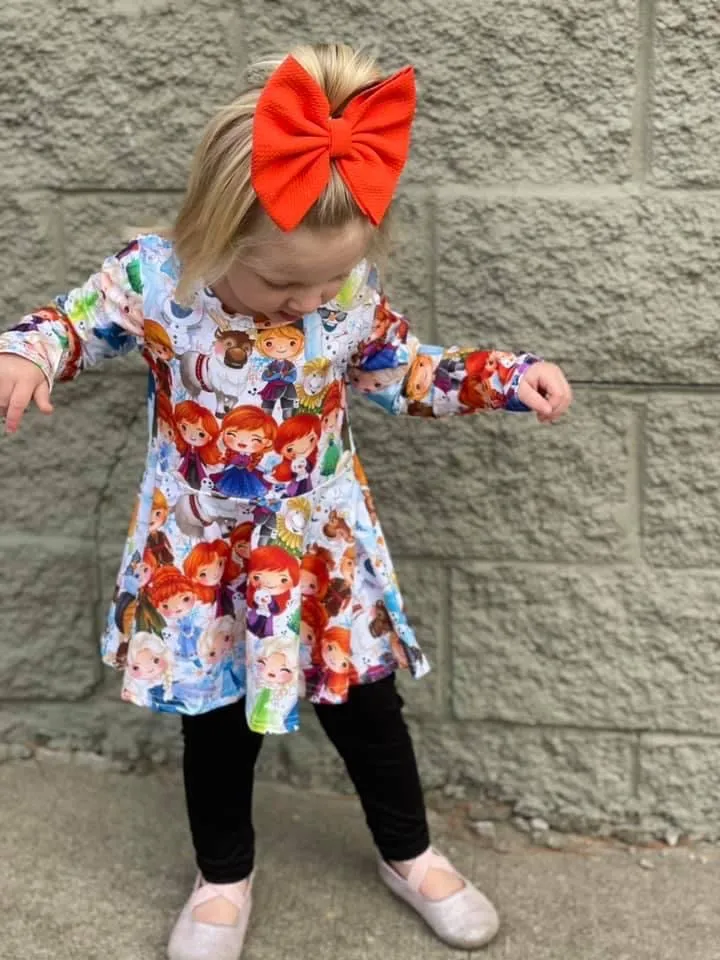 Frozen Long Sleeve Scoop Back Peplum Tunic