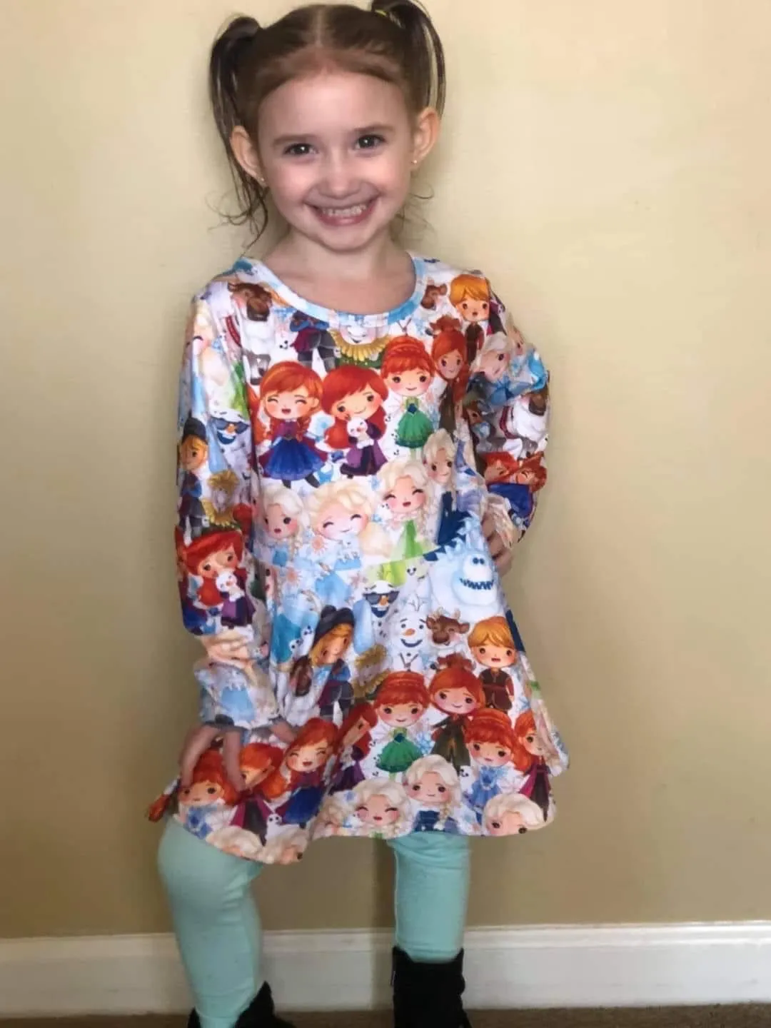 Frozen Long Sleeve Scoop Back Peplum Tunic