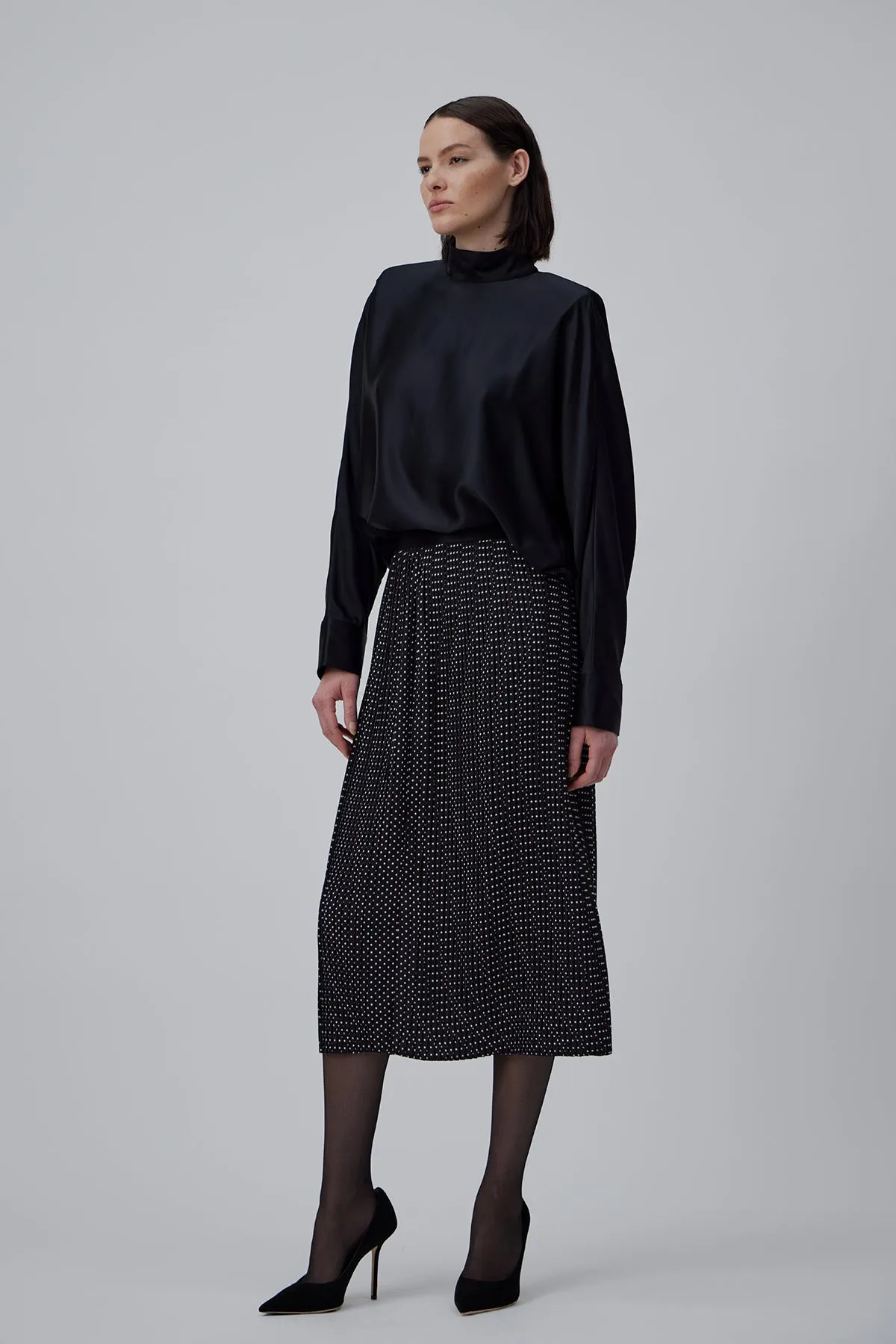 LONG PLEATED SKIRT IN POLKA PRINT